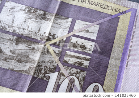 A close-up view of 100 Macedonian dinar banknote A close-up view of 100 Macedonian dinar banknote 141825460