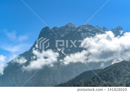 Mount Kinabalu shrouded in clouds, Borneo, Malaysia Mount Kinabalu shrouded in clouds, Borneo, Malaysia 141828020