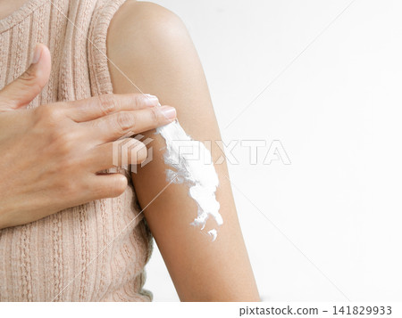 Woman apply lotion cream moisturizer on hand, lifestyle clean spa treatment natural aroma therapy wellness skin care, perfec girl skin tan authentic, beauty aesthetic cosmetic product concept. Woman apply lotion cream moisturizer on hand, lifestyle clean spa treatment natural aroma therapy wellness skin care, perfec girl skin tan authentic, beauty aesthetic cosmetic product concept. 141829933