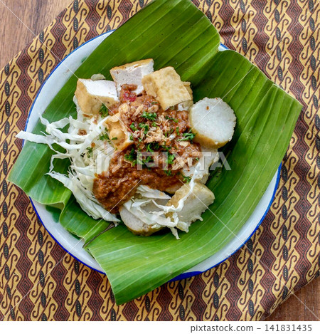 Traditional Indonesian Tahu Campur with Tofu Lontong Peanut Sauce Cabbage Traditional Indonesian Tahu Campur with Tofu Lontong Peanut Sauce Cabbage 141831435
