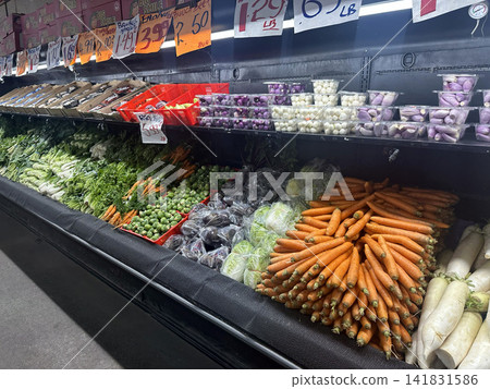A wide variety of fresh vegetables and price tags at American farmers markets. A wide variety of fresh vegetables and price tags at American farmers markets. 141831586