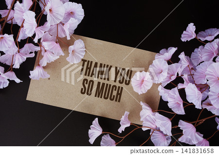 Thank You So Much text with flowers blooming decorated on black background Thank You So Much text with flowers blooming decorated on black background 141831658