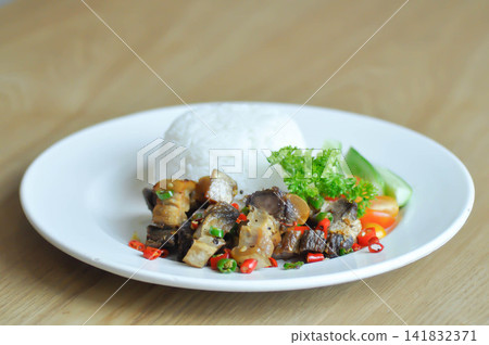 stir fried pork or deep fried pork , fried pork or crispy pork and rice or pork and rice for serve stir fried pork or deep fried pork , fried pork or crispy pork and rice or pork and rice for serve 141832371