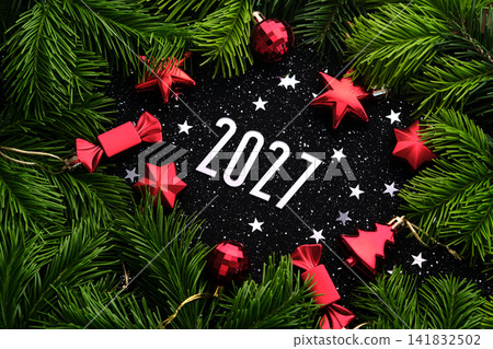 New Year 2027 background. Number of the coming year in Christmas decoration. New Year 2027 background. Number of the coming year in Christmas decoration. 141832502