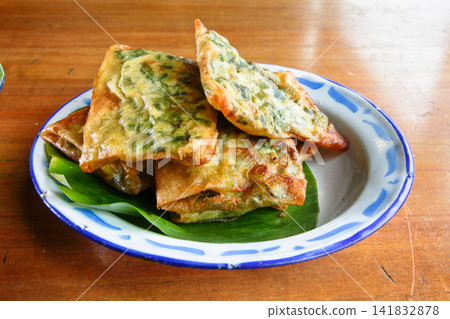 Mini Martabak Telur Traditional Indonesian Savory Egg Filled Snack Mini Martabak Telur Traditional Indonesian Savory Egg Filled Snack 141832878