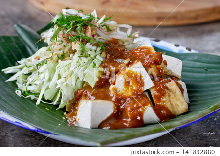 Tahu Campur Traditional Indonesian Mixed Tofu with Peanut Sauce Tahu Campur Traditional Indonesian Mixed Tofu with Peanut Sauce 141832880
