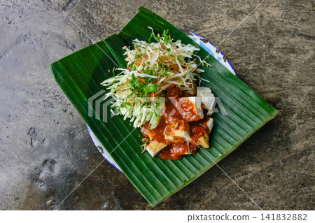 Tahu Campur Traditional Indonesian Mixed Tofu with Peanut Sauce Tahu Campur Traditional Indonesian Mixed Tofu with Peanut Sauce 141832882