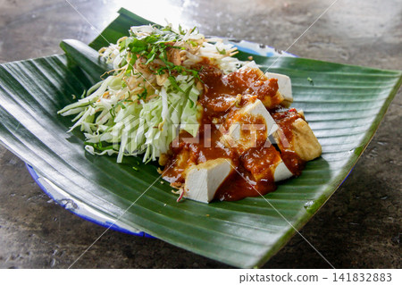 Tahu Campur Traditional Indonesian Mixed Tofu with Peanut Sauce Tahu Campur Traditional Indonesian Mixed Tofu with Peanut Sauce 141832883