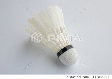 feather badminton shuttlecock on white paper texture background feather badminton shuttlecock on white paper texture background 141833025