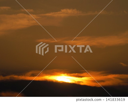 The setting sun turns orange The setting sun turns orange 141833619