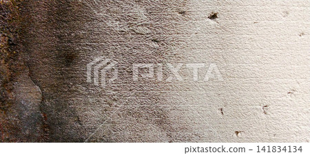 Weathered and stained lightweight concrete surface with a chevron texture. Weathered and stained lightweight concrete surface with a chevron texture. 141834134