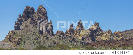 Roques de Garcia volcanic rocks in Teide National Park Tenerife, desert landscape with copy space Roques de Garcia volcanic rocks in Teide National Park Tenerife, desert landscape with copy space 141834375