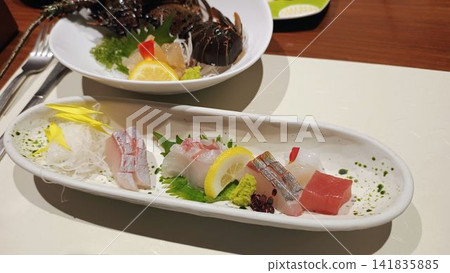 Fresh sashimi platter from Amakusa, Kumamoto, and spiny lobster sashimi Fresh sashimi platter from Amakusa, Kumamoto, and spiny lobster sashimi 141835885