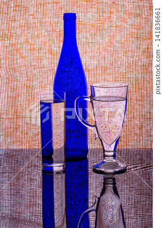 Still life with a blue bottle and a glass of water Still life with a blue bottle and a glass of water 141836661