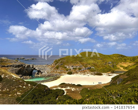 Coastal fan pond visible from a hill on the southern island of the Ogasawara Islands. Coastal fan pond visible from a hill on the southern island of the Ogasawara Islands. 141837654