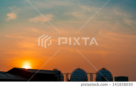 Industrial gas storage tank. LNG or liquefied natural gas storage tank. Spherical gas tank in petroleum refinery. Above-ground storage tank. Natural gas storage industry and global market consumption Industrial gas storage tank. LNG or liquefied natural gas storage tank. Spherical gas tank in petroleum refinery. Above-ground storage tank. Natural gas storage industry and global market consumption 141838030
