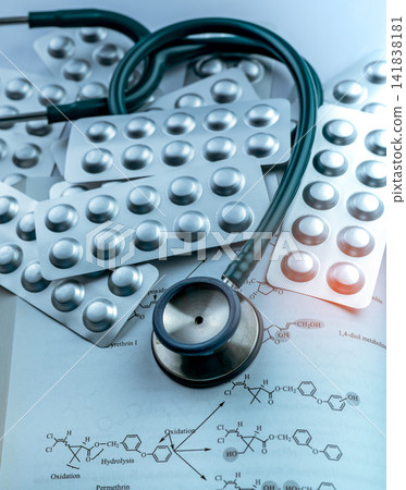 Medical stethoscope with pharmaceutical blister packs on scientific research document. Hospital healthcare, clinical pharmacy, prescription medicine, laboratory diagnostics and drug development. Medical stethoscope with pharmaceutical blister packs on scientific research document. Hospital healthcare, clinical pharmacy, prescription medicine, laboratory diagnostics and drug development. 141838181
