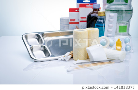 Wound care dressing set. Wound care equipment in hospital for nurse. Conform bandage, forceps, alcohol, cotton sticks, povidone-iodine for infection wound. Medical supply. Medical equipment for nurse. Wound care dressing set. Wound care equipment in hospital for nurse. Conform bandage, forceps, alcohol, cotton sticks, povidone-iodine for infection wound. Medical supply. Medical equipment for nurse. 141838375