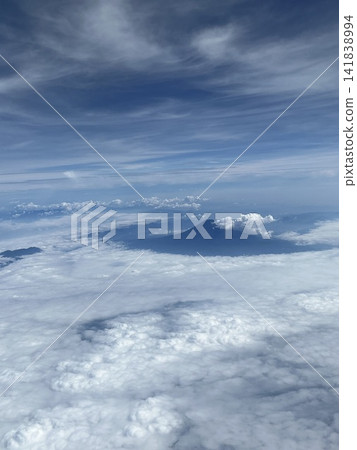 Clouds and Mt. Fuji seen from an airplane Clouds and Mt. Fuji seen from an airplane 141838994