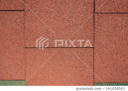 Aesthetic diagonal background of textured outdoor red rubber mat pavement, perfect for architectural Aesthetic diagonal background of textured outdoor red rubber mat pavement, perfect for architectural 141839563