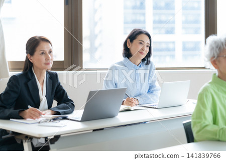 Senior women taking lessons Senior women taking lessons 141839766