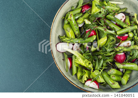 Fresh vegetable salad with asparagus radish and seeds Fresh vegetable salad with asparagus radish and seeds 141840051