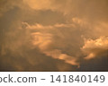 Beautiful orange sky creating a warm natural atmosphere, with intense colors and soft light typical of sunset or sunrise. 141840149