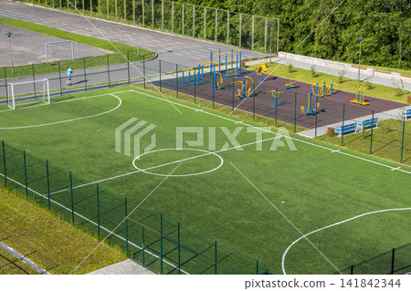 Open city sports grounds for playing football, stadium, weight training equipment, top view, General plan. Open city sports grounds for playing football, stadium, weight training equipment, top view, General plan. 141842344