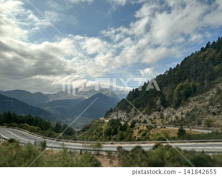 A road among the mountains and hills in continental Greece A road among the mountains and hills in continental Greece 141842655