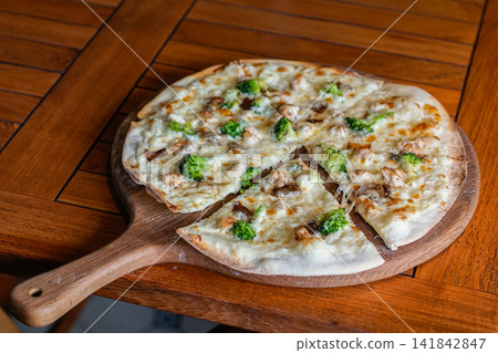 Chicken and Broccoli Pizza on Wooden Board Chicken and Broccoli Pizza on Wooden Board 141842847