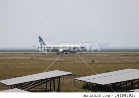 Airplane moving onto the runway Airplane moving onto the runway 141842922