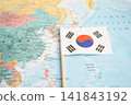 Bangkok, Thailand December 10, 2023 South Korea map in world map paper. 141843192