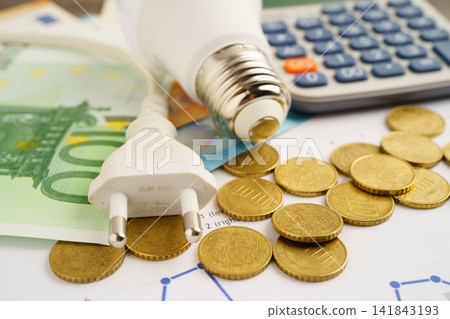 Cost of electric utilities with light bulb for payment. Cost of electric utilities with light bulb for payment. 141843193
