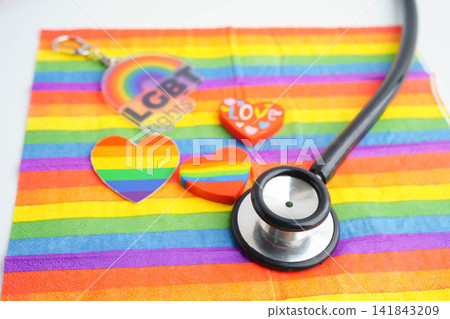 LGBT symbol, Stethoscope on rainbow flag, rights and gender equality, LGBT Pride Month in June. LGBT symbol, Stethoscope on rainbow flag, rights and gender equality, LGBT Pride Month in June. 141843209