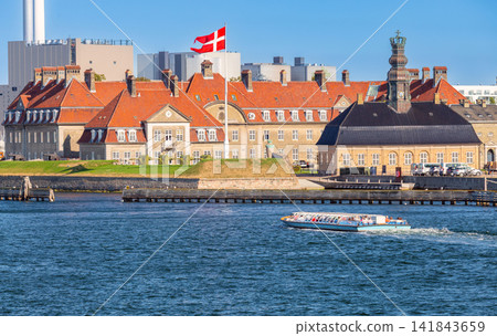 Historic Waterfront Buildings and Tour Boat in Copenhagen Denmark Historic Waterfront Buildings and Tour Boat in Copenhagen Denmark 141843659