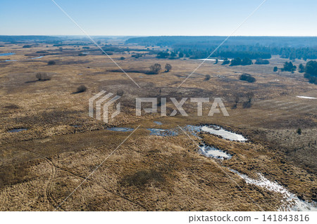 Narew river valley landscape with melting snow in early spring 141843816