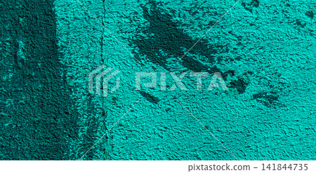 Weathered cyan stucco surface with dark stains and fine cracks. Weathered cyan stucco surface with dark stains and fine cracks. 141844735