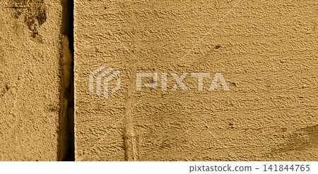 Golden Yellow Rough Stucco Wall Texture with Vertical Seam Golden Yellow Rough Stucco Wall Texture with Vertical Seam 141844765
