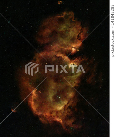 Vast emission nebula glowing with reddish and orange cosmic dust surrounded by stars in deep space. Vast emission nebula glowing with reddish and orange cosmic dust surrounded by stars in deep space. 141845285