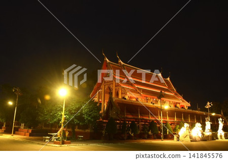 wat Pradu royal monastery Thai temple with electric lamp in night wat Pradu royal monastery Thai temple with electric lamp in night 141845576