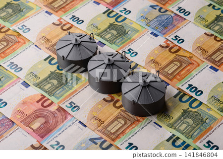 Oil tankers against the Euro money, concept of fuel supplies to Europe. Oil or liquefied gas tank Oil tankers against the Euro money, concept of fuel supplies to Europe. Oil or liquefied gas tank 141846804