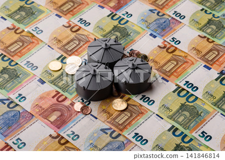 Oil tankers against the Euro money, concept of fuel supplies to Europe. Oil or liquefied gas tank Oil tankers against the Euro money, concept of fuel supplies to Europe. Oil or liquefied gas tank 141846814