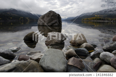Mountain Lake Landscape with Rocks and Misty Reflections Mountain Lake Landscape with Rocks and Misty Reflections 141846882