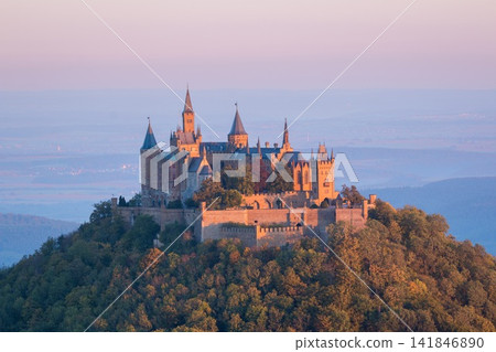 Hohenzollern Castle at Golden Hour in Misty German Landscape Hohenzollern Castle at Golden Hour in Misty German Landscape 141846890
