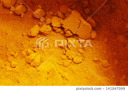 Turmeric powder natural spices as background. Turmeric powder natural spices as background. 141847099