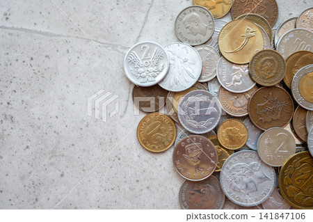 Old golden and silber coins on the stone background. Money from France, Poland, Italy, England, Denmark. Various coins for business. Financial concept. Old golden and silber coins on the stone background. Money from France, Poland, Italy, England, Denmark. Various coins for business. Financial concept. 141847106