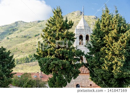 Montenegro Orthodox Church Dome and Christian Cross in Petrovac Montenegro Orthodox Church Dome and Christian Cross in Petrovac 141847169