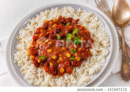 Rajma Masala served with Rice on a plate Rajma Masala served with Rice on a plate 141847218