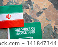 National flag of Iran and Saudi Arabia on the world map background. Iran and USA conflict and crisis.  141847344
