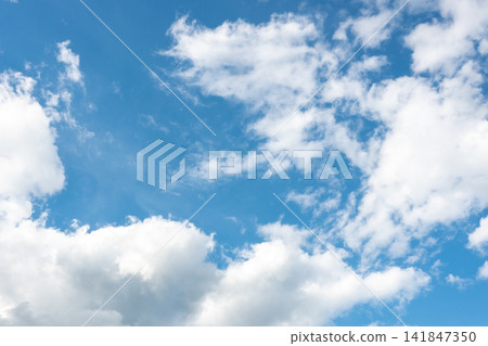 Beautiful sky over the house after a storm with white and dark clouds in the city. Panoramic view of sunset. Beautiful sky over the house after a storm with white and dark clouds in the city. Panoramic view of sunset. 141847350